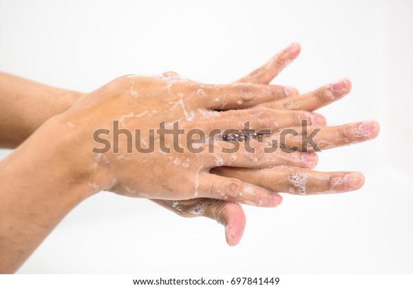 04884649---closeup-asian-man-hand-wash-600w-697841449.jpg